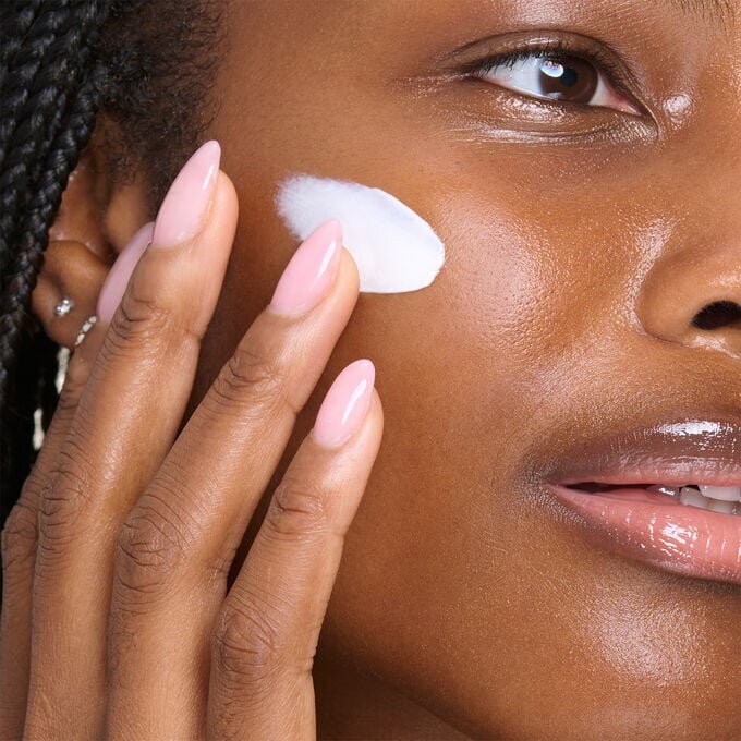 Extra-Firming Day SPF 15 rechargeable moisturizer, with collagen polypeptide and niacinamide